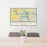 24x36 Truman Lake Missouri Map Print Lanscape Orientation in Woodblock Style Behind 2 Chairs Table and Potted Plant