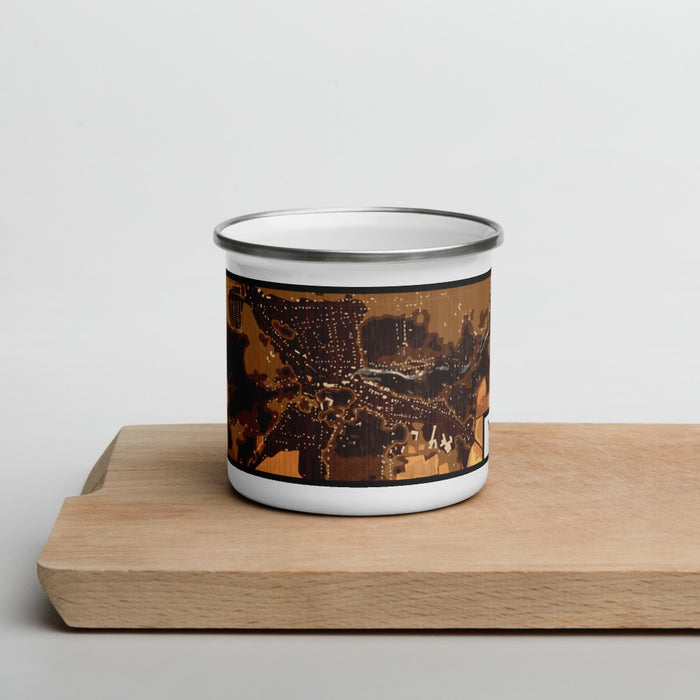 Front View Custom Trumansburg New York Map Enamel Mug in Ember on Cutting Board