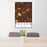 24x36 Tucson Arizona Map Print Portrait Orientation in Ember Style Behind 2 Chairs Table and Potted Plant