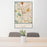 24x36 Tucson Arizona Map Print Portrait Orientation in Woodblock Style Behind 2 Chairs Table and Potted Plant