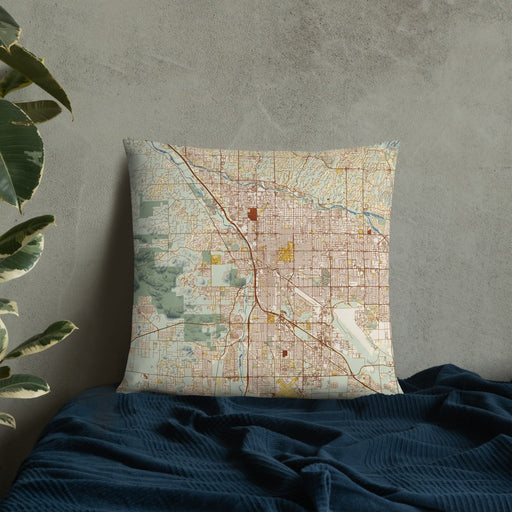 Custom Tucson Arizona Map Throw Pillow in Woodblock on Bedding Against Wall