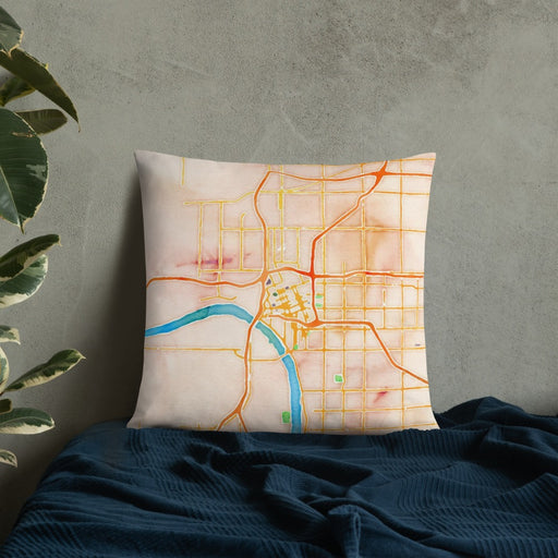 Custom Tulsa Oklahoma Map Throw Pillow in Watercolor on Bedding Against Wall