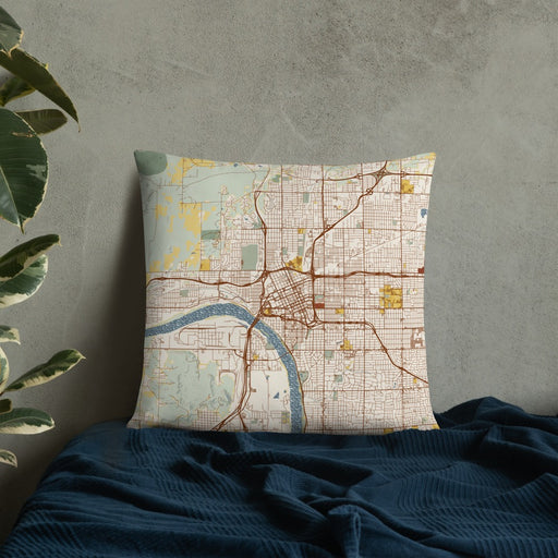 Custom Tulsa Oklahoma Map Throw Pillow in Woodblock on Bedding Against Wall