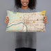 Person holding 20x12 Custom Tulsa Oklahoma Map Throw Pillow in Woodblock