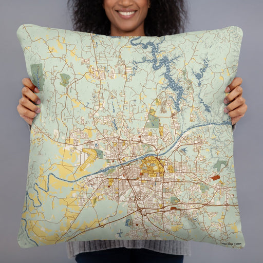Person holding 22x22 Custom Tuscaloosa Alabama Map Throw Pillow in Woodblock