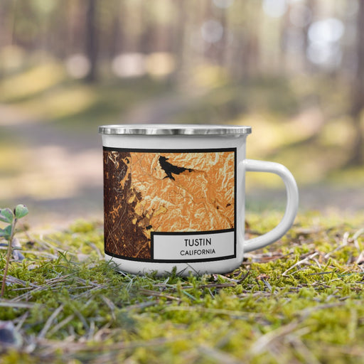 Right View Custom Tustin California Map Enamel Mug in Ember on Grass With Trees in Background