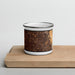 Front View Custom Tustin California Map Enamel Mug in Ember on Cutting Board