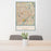 24x36 Twin Cities Minnesota Map Print Portrait Orientation in Woodblock Style Behind 2 Chairs Table and Potted Plant
