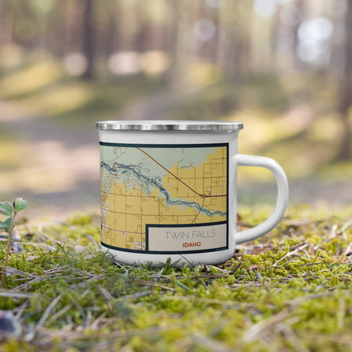 Right View Custom Twin Falls Idaho Map Enamel Mug in Woodblock on Grass With Trees in Background