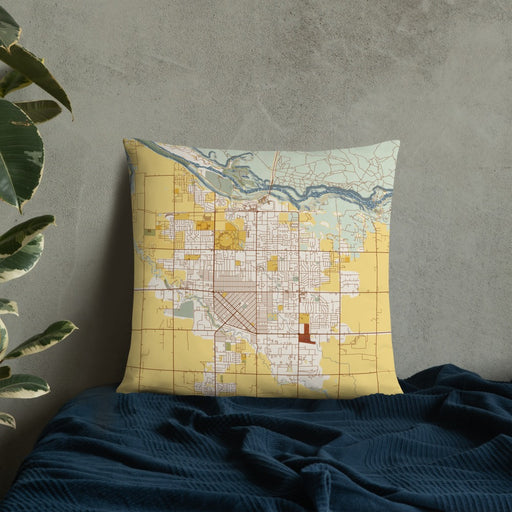 Custom Twin Falls Idaho Map Throw Pillow in Woodblock on Bedding Against Wall
