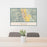 24x36 Ukiah California Map Print Lanscape Orientation in Woodblock Style Behind 2 Chairs Table and Potted Plant