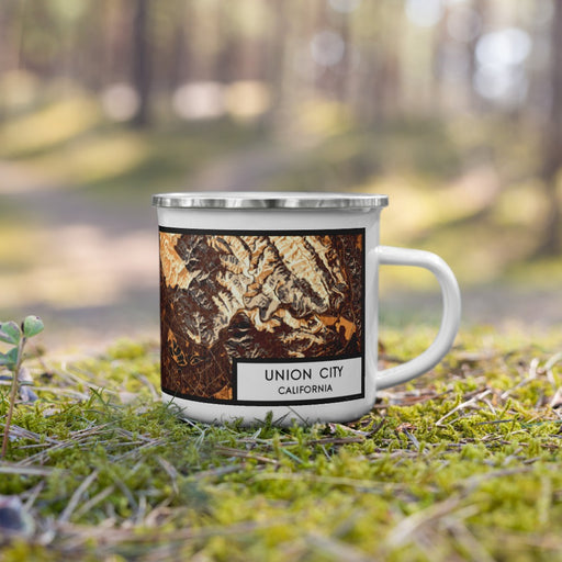 Right View Custom Union City California Map Enamel Mug in Ember on Grass With Trees in Background
