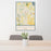 24x36 Uniontown Ohio Map Print Portrait Orientation in Woodblock Style Behind 2 Chairs Table and Potted Plant