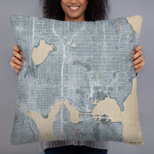Person holding 22x22 Custom University District Seattle Map Throw Pillow in Afternoon