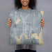 Person holding 18x18 Custom University District Seattle Map Throw Pillow in Afternoon