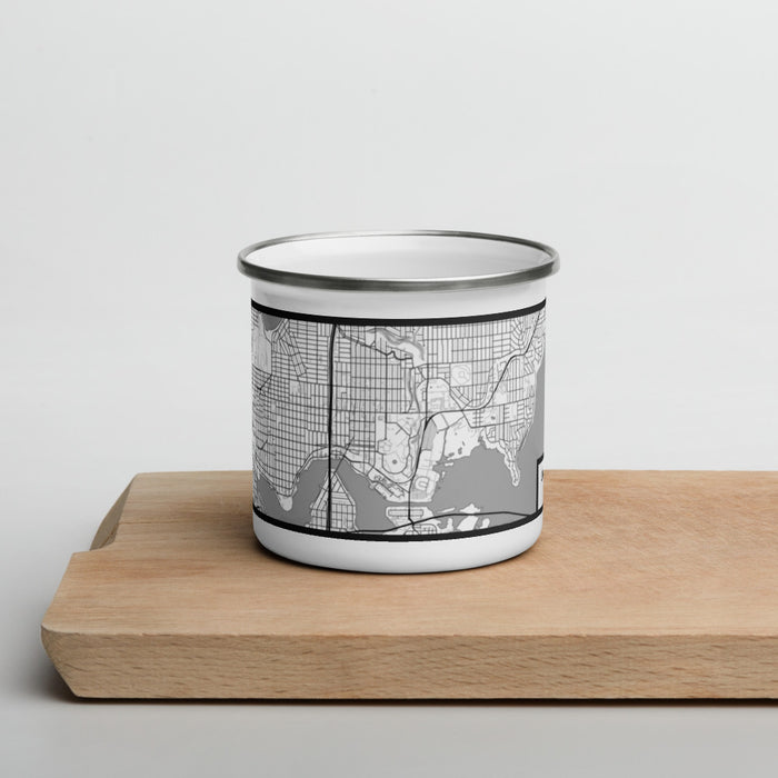 Front View Custom University District Seattle Map Enamel Mug in Classic on Cutting Board