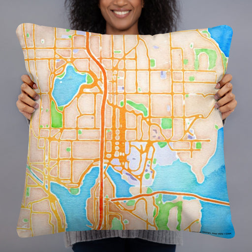 Person holding 22x22 Custom University District Seattle Map Throw Pillow in Watercolor