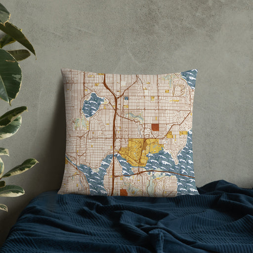 Custom University District Seattle Map Throw Pillow in Woodblock on Bedding Against Wall