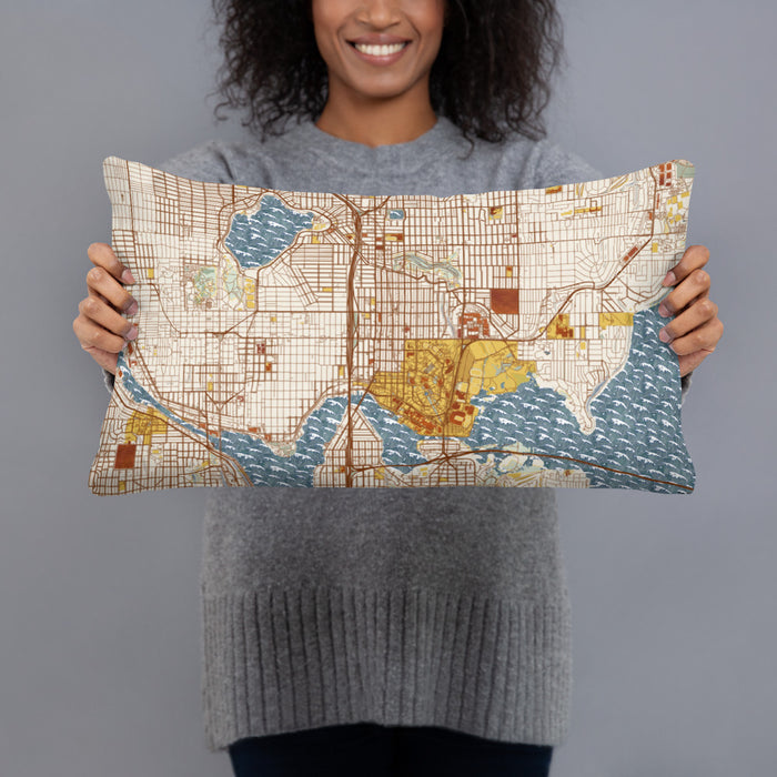 Person holding 20x12 Custom University District Seattle Map Throw Pillow in Woodblock