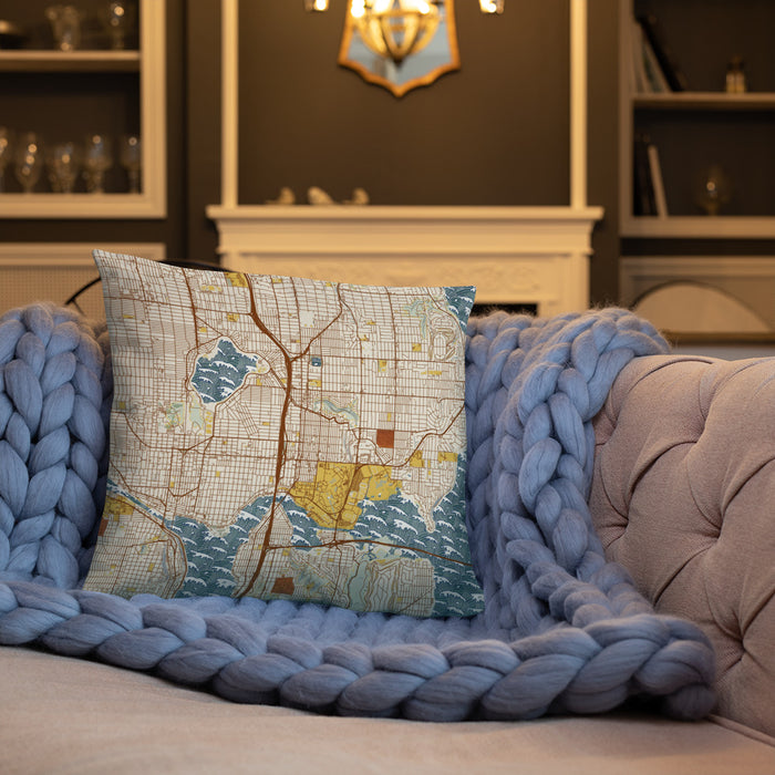 Custom University District Seattle Map Throw Pillow in Woodblock on Cream Colored Couch