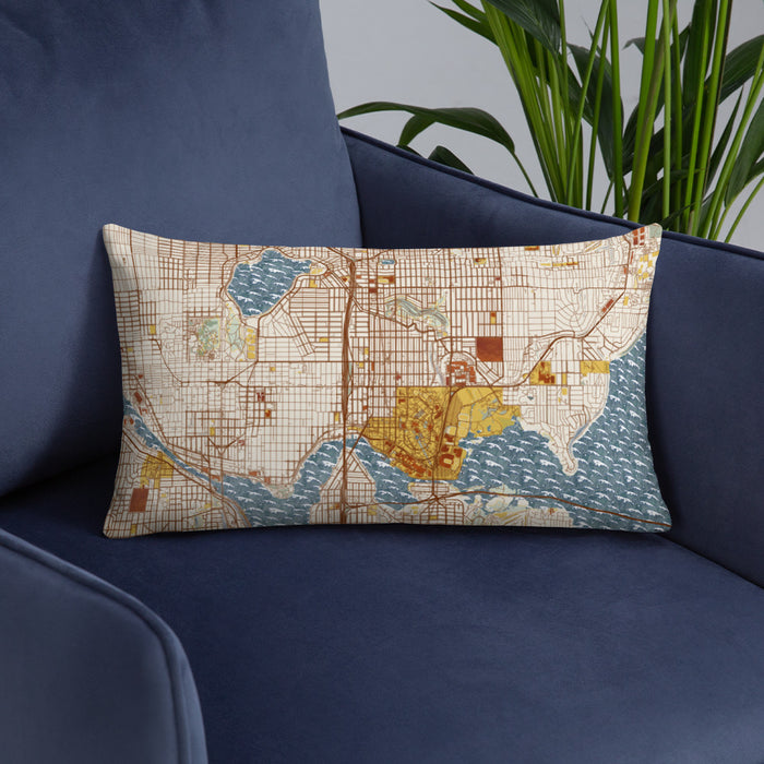Custom University District Seattle Map Throw Pillow in Woodblock on Blue Colored Chair