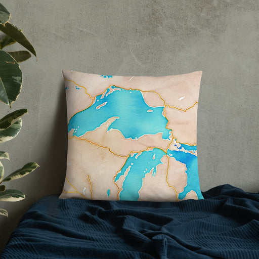 Custom Upper Peninsula Michigan Map Throw Pillow in Watercolor on Bedding Against Wall