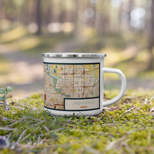 Right View Custom Urbandale Iowa Map Enamel Mug in Woodblock on Grass With Trees in Background