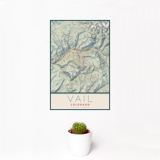12x18 Vail Colorado Map Print Portrait Orientation in Woodblock Style With Small Cactus Plant in White Planter