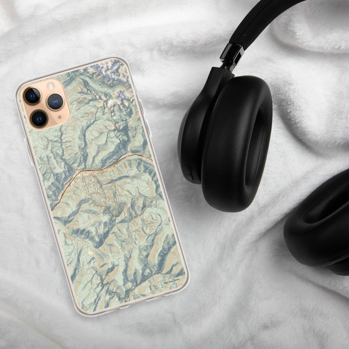 Custom Vail Colorado Map Phone Case in Woodblock on Table with Black Headphones
