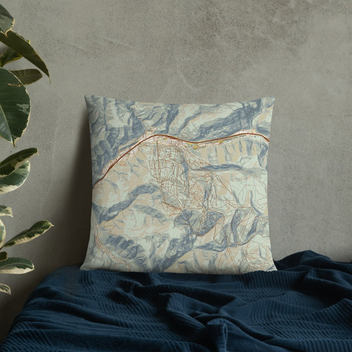 Custom Vail Colorado Map Throw Pillow in Woodblock on Bedding Against Wall