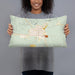 Person holding 20x12 Custom Valentine Nebraska Map Throw Pillow in Woodblock