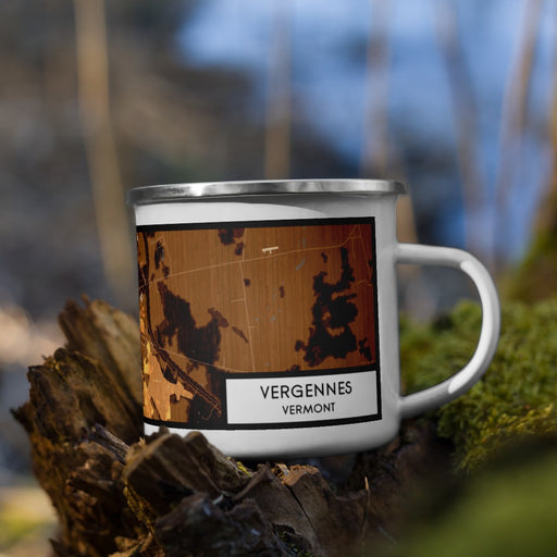 Right View Custom Vergennes Vermont Map Enamel Mug in Ember on Grass With Trees in Background