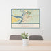 24x36 Vicksburg Mississippi Map Print Lanscape Orientation in Woodblock Style Behind 2 Chairs Table and Potted Plant