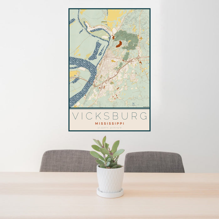 24x36 Vicksburg Mississippi Map Print Portrait Orientation in Woodblock Style Behind 2 Chairs Table and Potted Plant