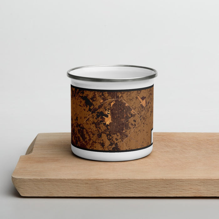 Front View Custom Victoria Texas Map Enamel Mug in Ember on Cutting Board