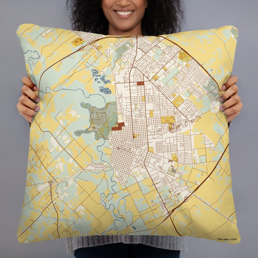 Person holding 22x22 Custom Victoria Texas Map Throw Pillow in Woodblock