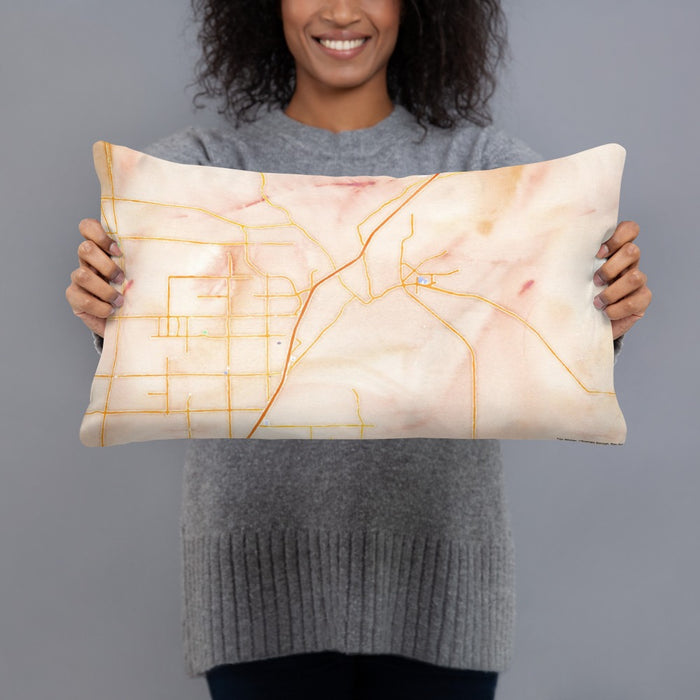 Person holding 20x12 Custom Victorville California Map Throw Pillow in Watercolor