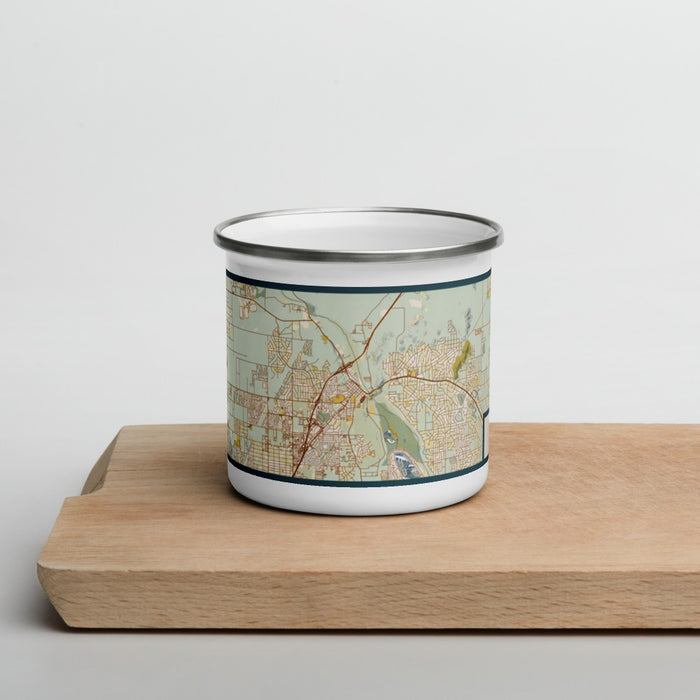Front View Custom Victorville California Map Enamel Mug in Woodblock on Cutting Board
