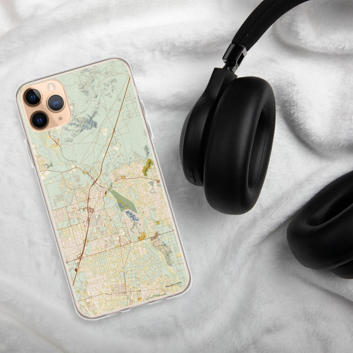 Custom Victorville California Map Phone Case in Woodblock on Table with Black Headphones