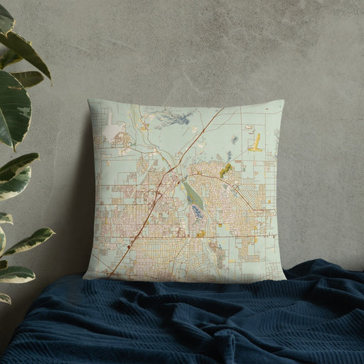 Custom Victorville California Map Throw Pillow in Woodblock on Bedding Against Wall