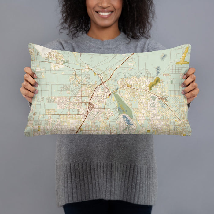 Person holding 20x12 Custom Victorville California Map Throw Pillow in Woodblock