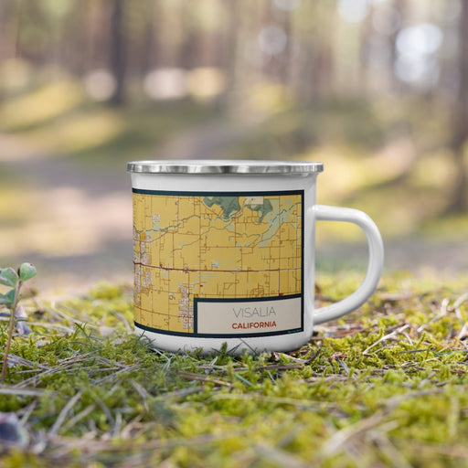 Right View Custom Visalia California Map Enamel Mug in Woodblock on Grass With Trees in Background