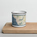 Front View Custom Waianae Hawaii Map Enamel Mug in Woodblock on Cutting Board