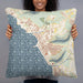 Person holding 22x22 Custom Waianae Hawaii Map Throw Pillow in Woodblock
