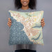 Person holding 18x18 Custom Waianae Hawaii Map Throw Pillow in Woodblock