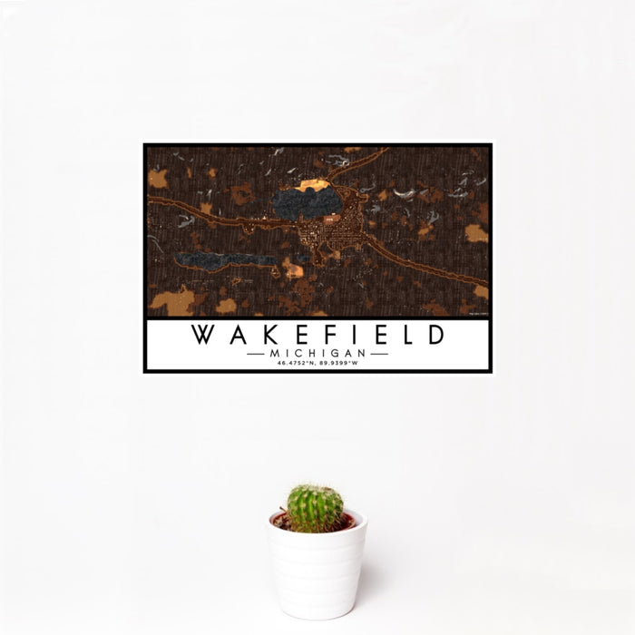 12x18 Wakefield Michigan Map Print Landscape Orientation in Ember Style With Small Cactus Plant in White Planter