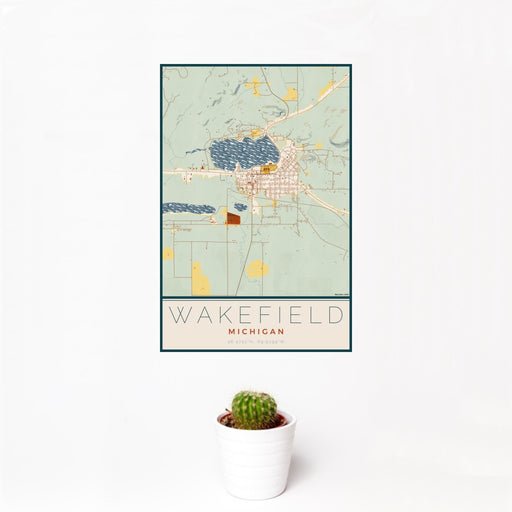 12x18 Wakefield Michigan Map Print Portrait Orientation in Woodblock Style With Small Cactus Plant in White Planter