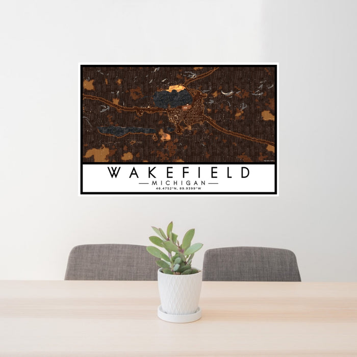 24x36 Wakefield Michigan Map Print Lanscape Orientation in Ember Style Behind 2 Chairs Table and Potted Plant