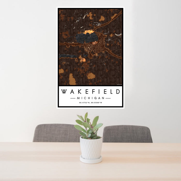 24x36 Wakefield Michigan Map Print Portrait Orientation in Ember Style Behind 2 Chairs Table and Potted Plant