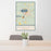 24x36 Wakefield Michigan Map Print Portrait Orientation in Woodblock Style Behind 2 Chairs Table and Potted Plant